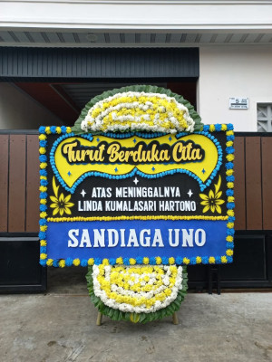 Papan Bunga Duka di Komperta